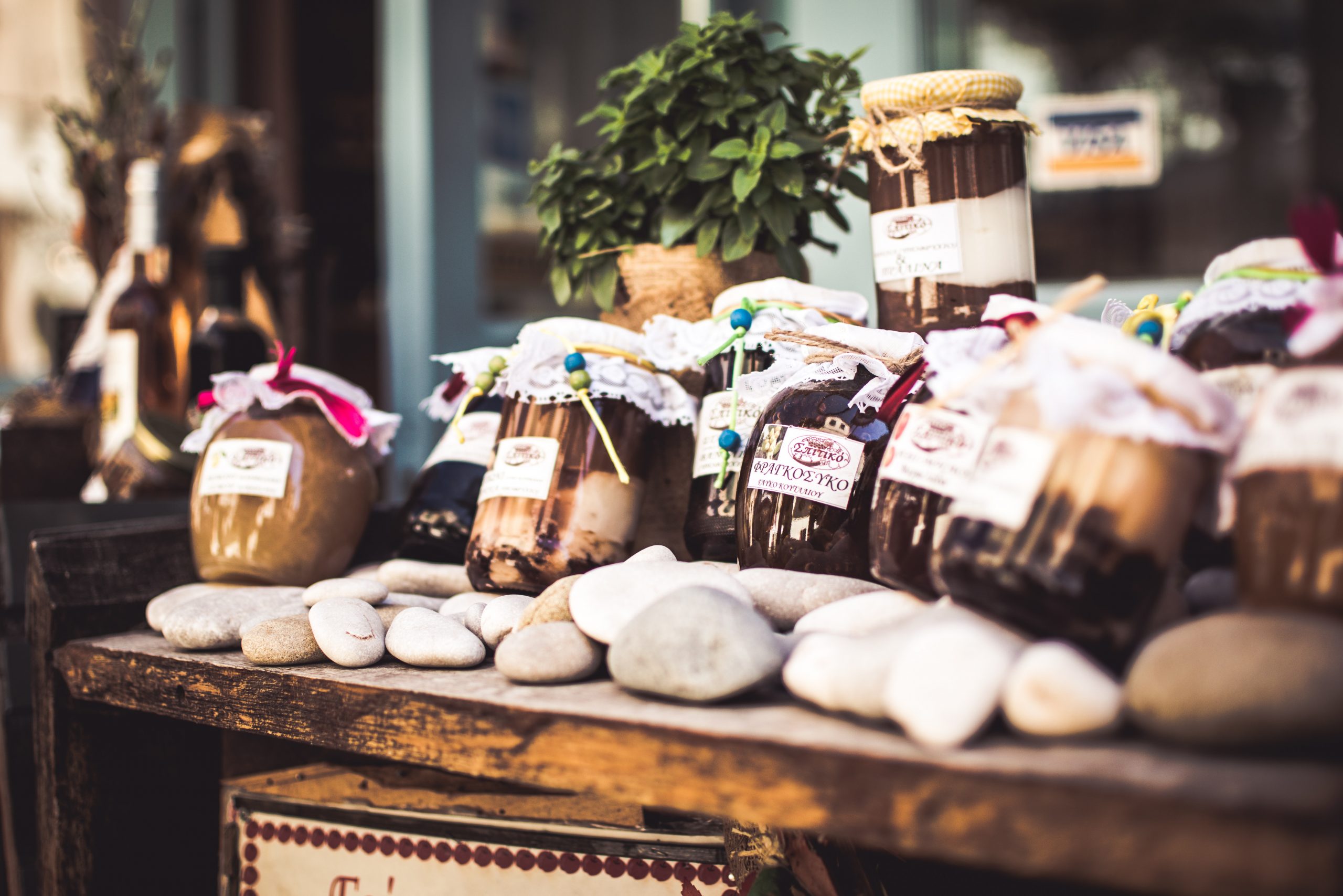 A photo of handmade jars of food at a craft fair.