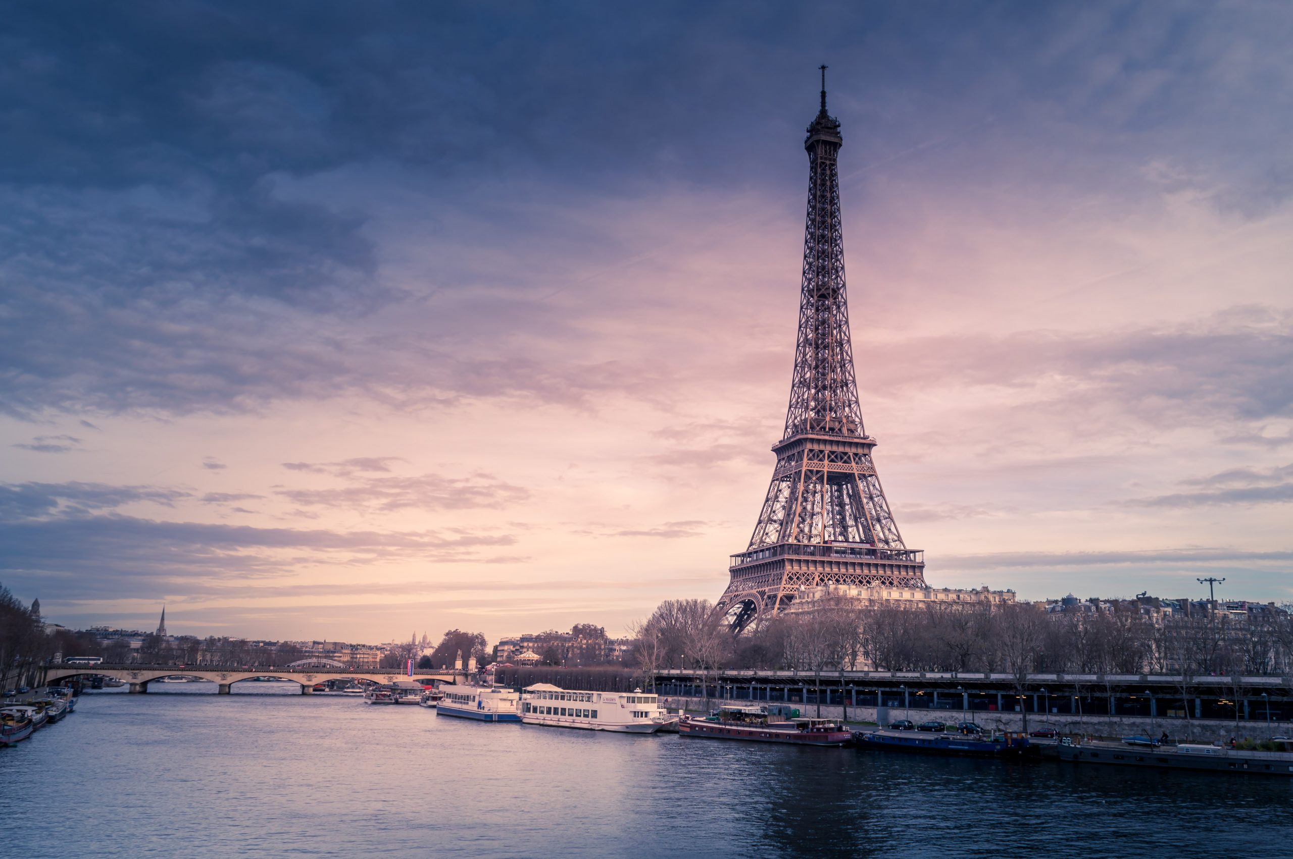 Decorative image of the Eiffel Tower and River Seine in Paris. 