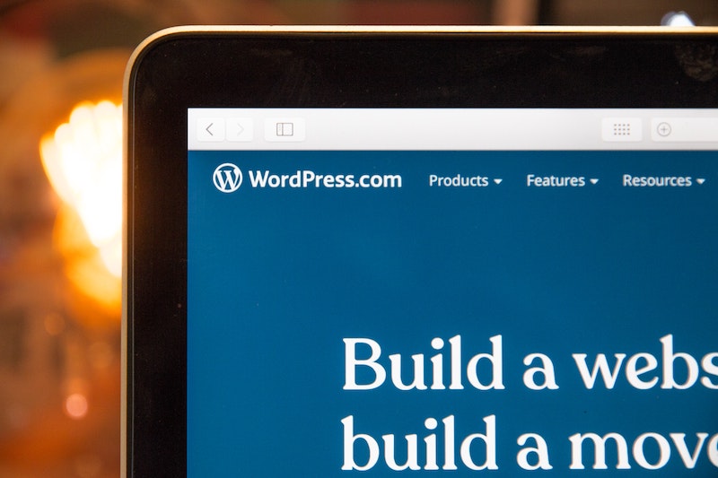 Picture of a corner of a laptop with WordPress.com open. 