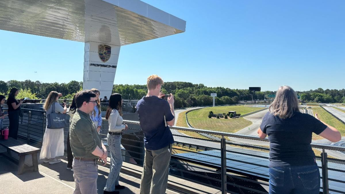 Vroom! The NMI Rides in Style with Porsche